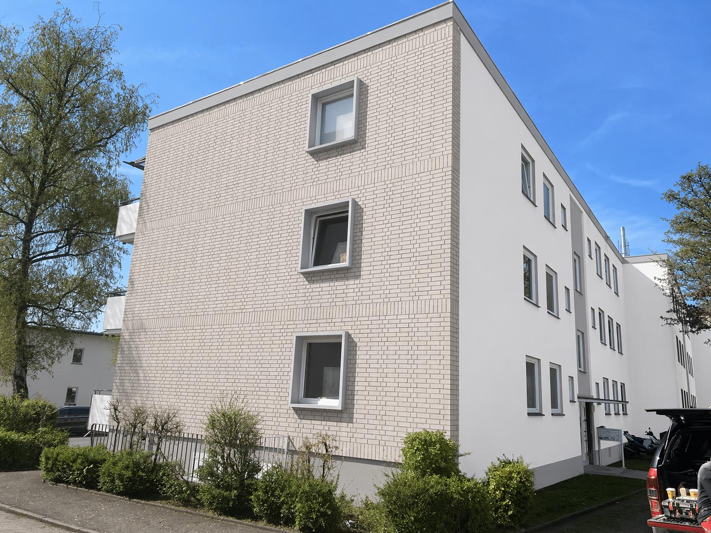 Giebelansicht des Mehrfamilienhauses am Baumschulenweg